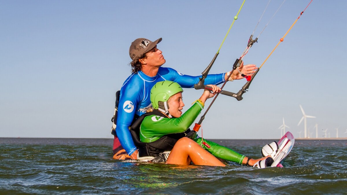 kitesurf instructor and student flying a kite